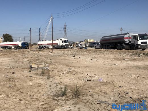 موظفو العقود في حماية الانابيب النفطية يتظاهرون في الناصرية لتثبيتهم على الملاك الدائم - تقرير مصور -