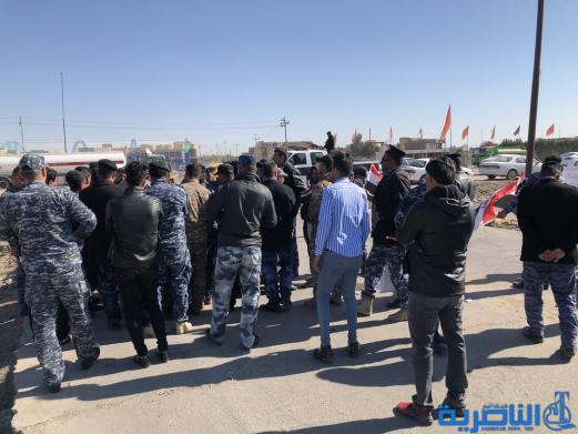 موظفو العقود في حماية الانابيب النفطية يتظاهرون في الناصرية لتثبيتهم على الملاك الدائم - تقرير مصور -