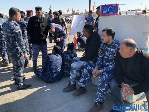 موظفو العقود في حماية الانابيب النفطية يتظاهرون في الناصرية لتثبيتهم على الملاك الدائم - تقرير مصور -