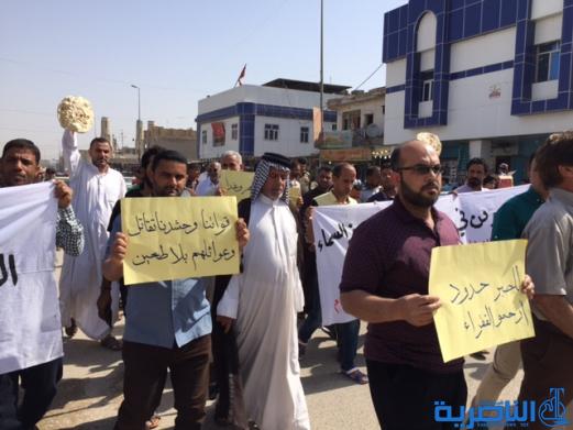 بعد ان قفزت اسعارة الى الضعف ، الطحين المفقود يدفع العشرات للتظاهر في الناصرية - تقرير مصور -