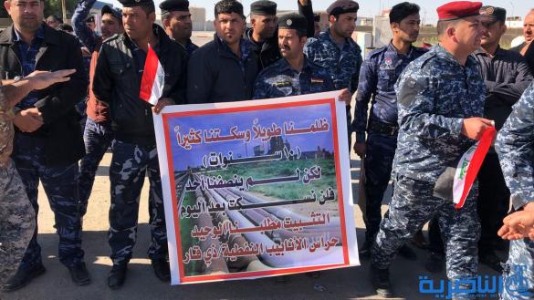 موظفو العقود في حماية الانابيب النفطية يتظاهرون في الناصرية لتثبيتهم على الملاك الدائم - تقرير مصور -