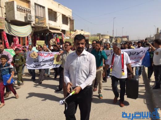 بعد ان قفزت اسعارة الى الضعف ، الطحين المفقود يدفع العشرات للتظاهر في الناصرية - تقرير مصور -