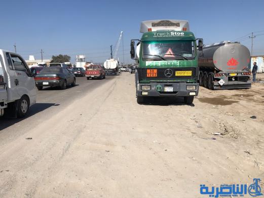 موظفو العقود في حماية الانابيب النفطية يتظاهرون في الناصرية لتثبيتهم على الملاك الدائم - تقرير مصور -