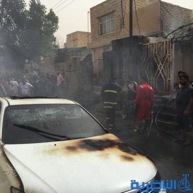 بالصور :حريق مجهول المصدر يلتهم ثلاث سيارات ومنزلين اثنين في الناصرية