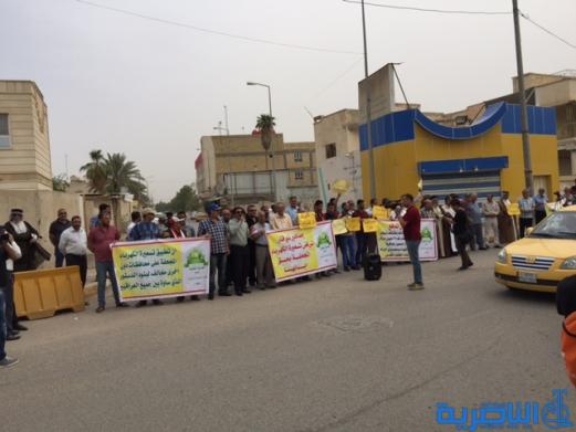 بالصور : العشرات يتظاهرون ضد خصخصة الكهرباء في الناصرية