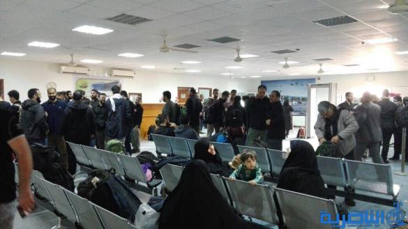 بالصور:مطار الناصرية الدولي يستقبل رحلتين  من طهران  وعلى متنها ٣٠٠ مسافر