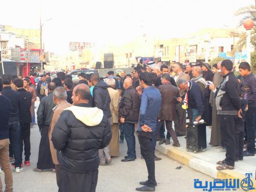 بالصور : العشرات يتظاهرون في الناصرية للمطالبة باصلاح النظام والعدالة الاجتماعية