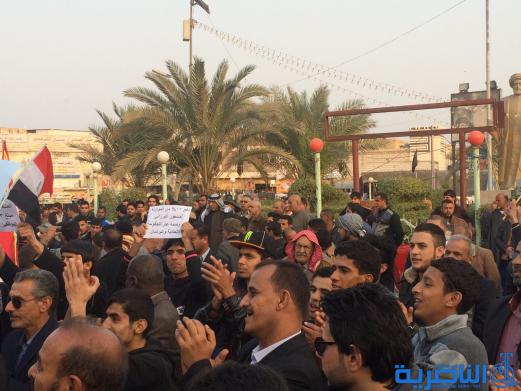 بالصور : العشرات يتظاهرون في الناصرية للمطالبة باصلاح النظام والعدالة الاجتماعية