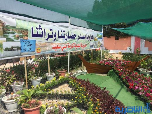 بالصور...محافظ ذي قار ووزيرة الاعمار يفتتحان معرض الزهور الثالث في الناصرية