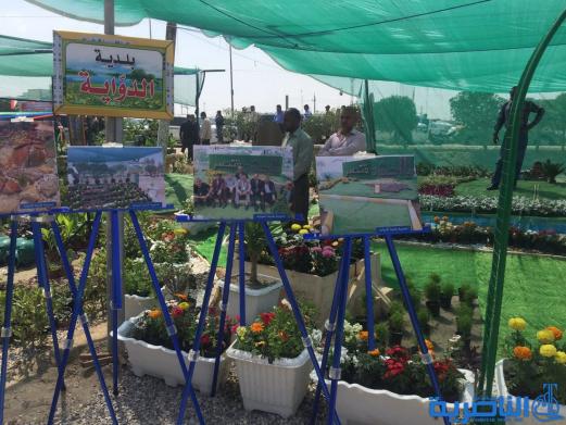 بالصور...محافظ ذي قار ووزيرة الاعمار يفتتحان معرض الزهور الثالث في الناصرية