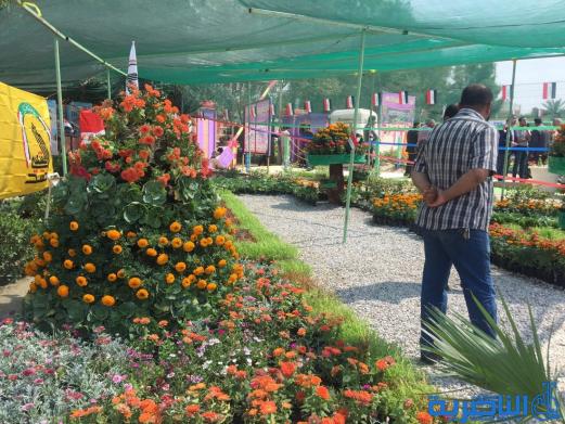 بالصور...محافظ ذي قار ووزيرة الاعمار يفتتحان معرض الزهور الثالث في الناصرية