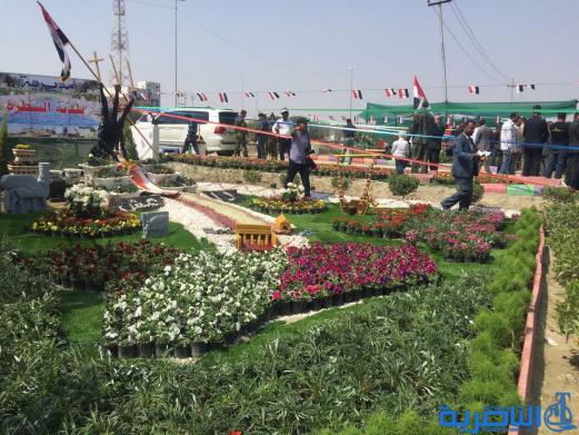 بالصور...محافظ ذي قار ووزيرة الاعمار يفتتحان معرض الزهور الثالث في الناصرية