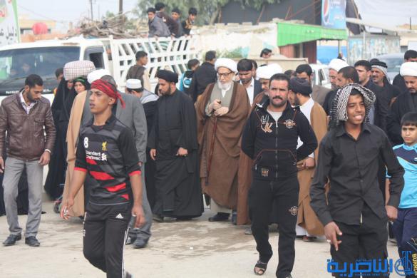 بالصور : طلبة الحوزة الدينية في الناصرية يتقدمهم اية الله الناصري يشاركون زوار الاربعينية مسيرتهم نحو كربلاء