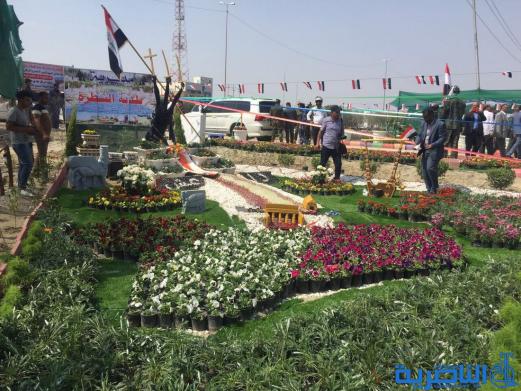 بالصور...محافظ ذي قار ووزيرة الاعمار يفتتحان معرض الزهور الثالث في الناصرية