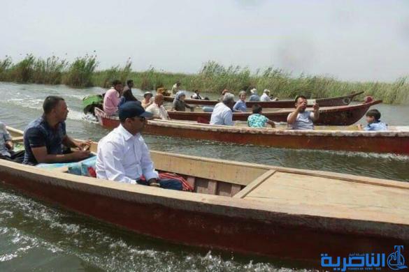 بالصور : الفرنسيات يخبزن بتنور الطين في اهوار الجبايش