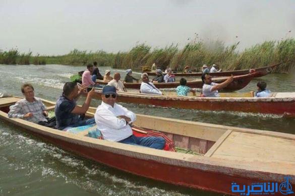 بالصور : الفرنسيات يخبزن بتنور الطين في اهوار الجبايش