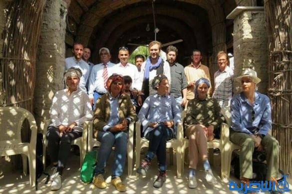 بالصور : الفرنسيات يخبزن بتنور الطين في اهوار الجبايش