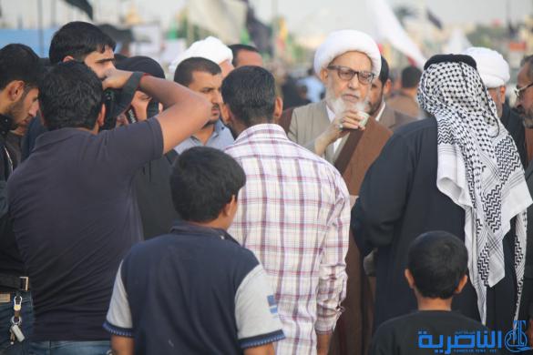 بالصور : طلبة الحوزة الدينية في الناصرية يتقدمهم اية الله الناصري يشاركون زوار الاربعينية مسيرتهم نحو كربلاء