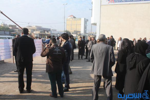  بالصور  :موظفو المصارف في ذي قار ينظمون وقفة احتجاجية ضد سلم الرواتب الجديد