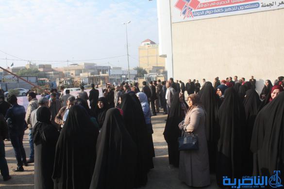  بالصور  :موظفو المصارف في ذي قار ينظمون وقفة احتجاجية ضد سلم الرواتب الجديد
