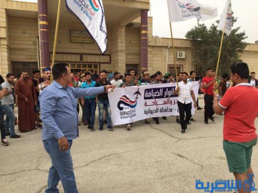 بالصور:وصول 400 سائحا الى محطة الناصرية للقطارات لغرض السياحة في الاهوار