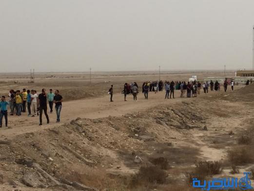 بالصور:سواح بغداد والديوانية في زقورة اور الاثرية