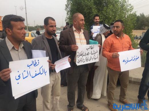  العشرات يتظاهرون في الناصرية للمطالبة باطلاق قروض الاسكان