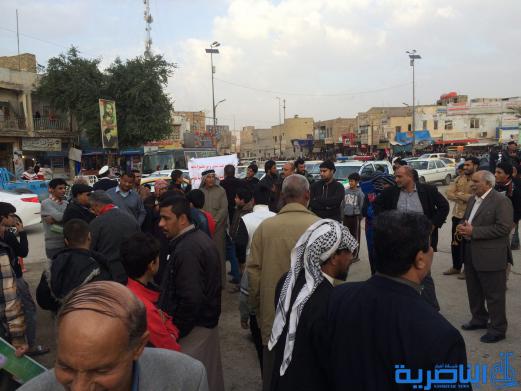 بالصور : متظاهرو الناصرية يجددون مطالبتهم بالاصلاح الحكومي بعد مرور عام 