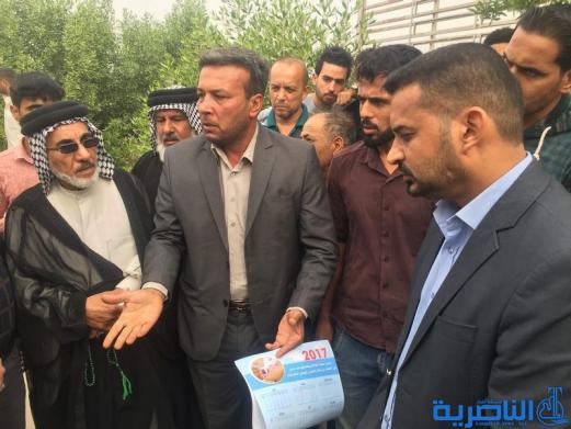  العشرات يتظاهرون في الناصرية للمطالبة باطلاق قروض الاسكان
