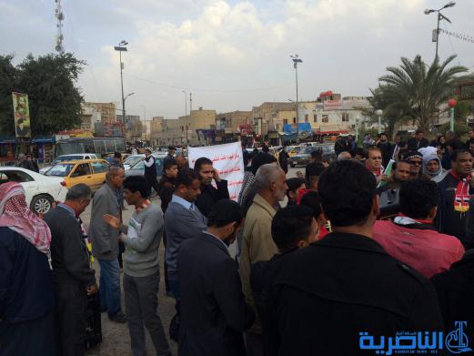 بالصور : متظاهرو الناصرية يجددون مطالبتهم بالاصلاح الحكومي بعد مرور عام 