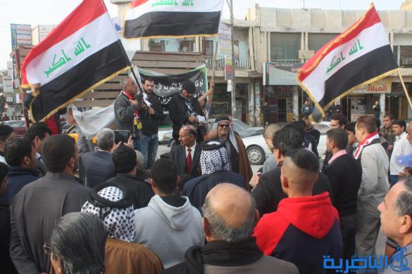 بالصور : العشرات يتظاهرون في الناصرية للمطالبة باصلاح الخدمات في المحافظة 