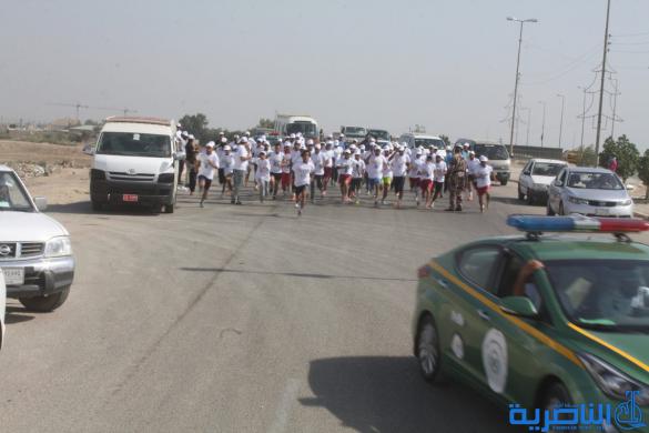 احتفاء بيوم الرياضة ، الناصرية تقيم مارثونا رياضيا بمشاركة 150 متسابقا - تقرير مصور -