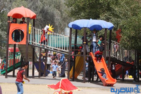 بالصور:متنزه الناصرية يستقبل العوائل بعيد الربيع