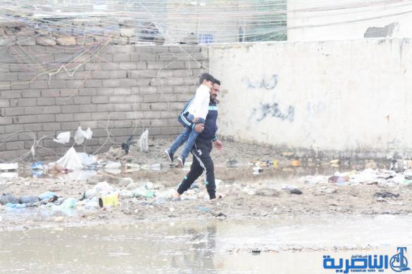 بالصور : الى بلدية الناصرية ، هذه شوارعكم بعد ليلة مطر واحدة