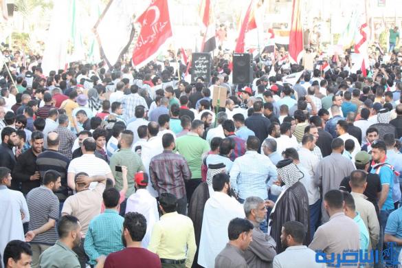 بالصور:الصدريون يتظاهرون وسط الناصرية تنديدا بتهديد الصدر 