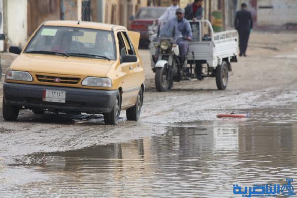 بالصور : الى بلدية الناصرية ، هذه شوارعكم بعد ليلة مطر واحدة