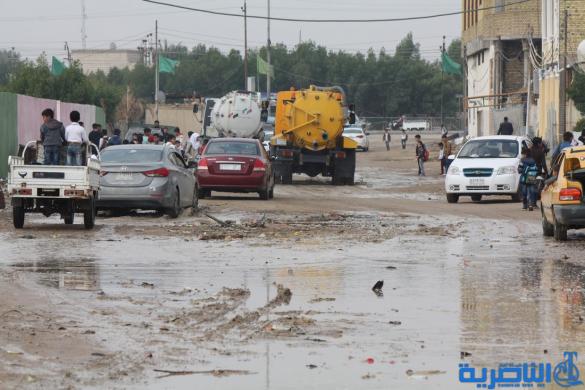 بالصور : الى بلدية الناصرية ، هذه شوارعكم بعد ليلة مطر واحدة