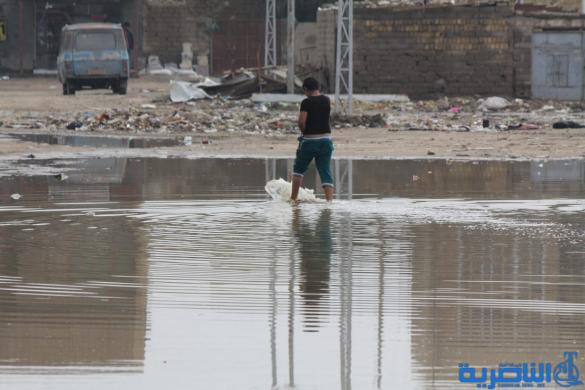 بالصور : الى بلدية الناصرية ، هذه شوارعكم بعد ليلة مطر واحدة