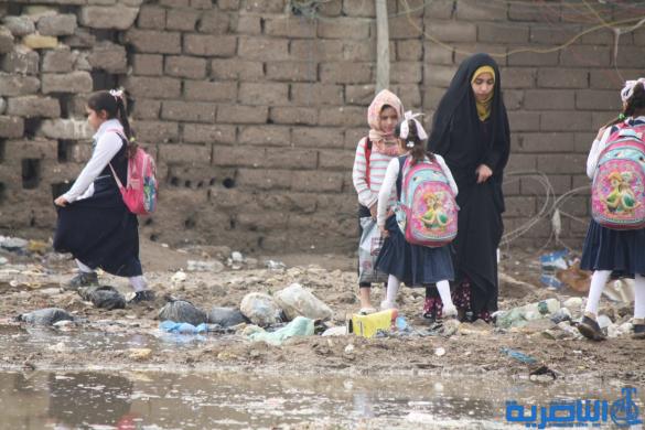 بالصور : الى بلدية الناصرية ، هذه شوارعكم بعد ليلة مطر واحدة