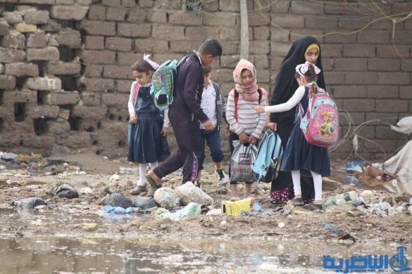 بالصور : الى بلدية الناصرية ، هذه شوارعكم بعد ليلة مطر واحدة