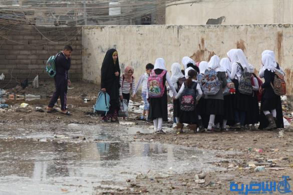 بالصور : الى بلدية الناصرية ، هذه شوارعكم بعد ليلة مطر واحدة