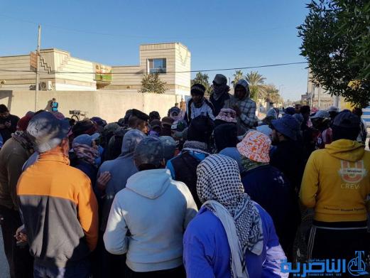 العشرات من عمال بلدية الناصرية يتظاهرون للمطالبة باطلاق رواتبهم المتاخرة - تقرير مصور -
