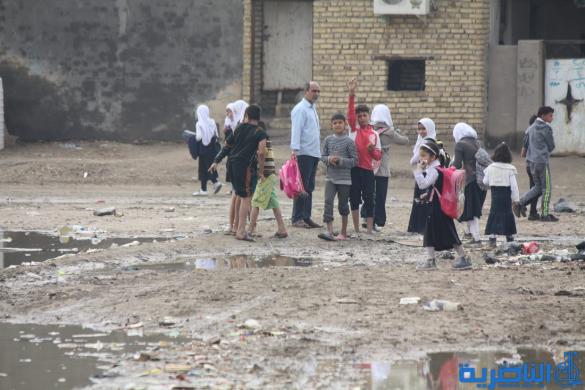 بالصور : الى بلدية الناصرية ، هذه شوارعكم بعد ليلة مطر واحدة