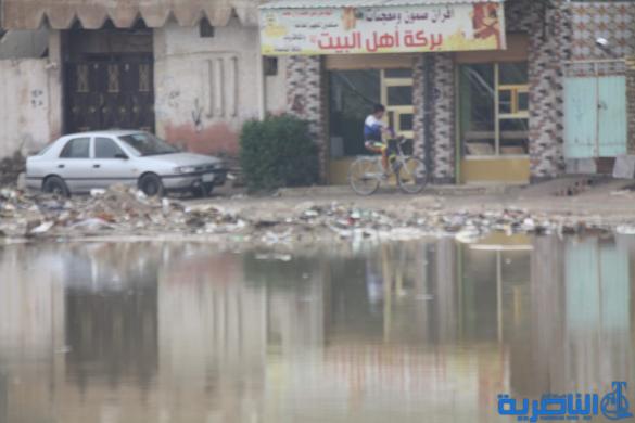 بالصور : الى بلدية الناصرية ، هذه شوارعكم بعد ليلة مطر واحدة