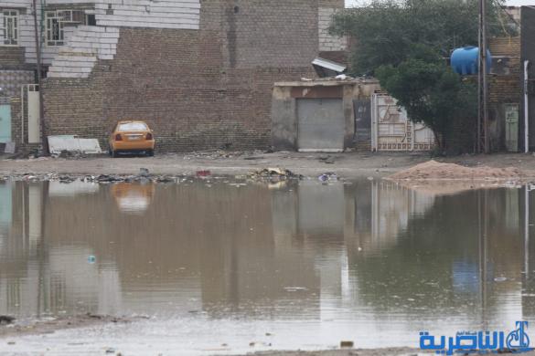 بالصور : الى بلدية الناصرية ، هذه شوارعكم بعد ليلة مطر واحدة