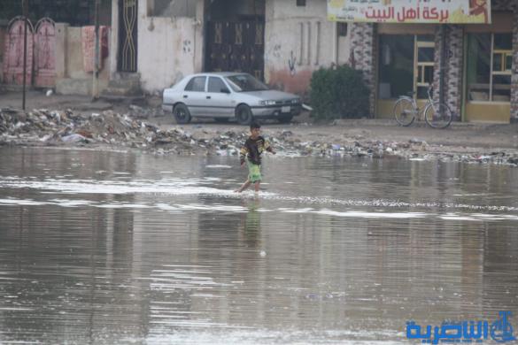 بالصور : الى بلدية الناصرية ، هذه شوارعكم بعد ليلة مطر واحدة
