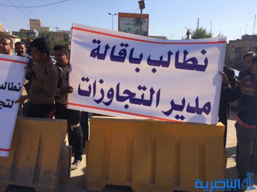  اصحاب معارض السيارات في الناصرية يتظاهرون احتجاجا على قرار اخلائهم - تقرير مصور -