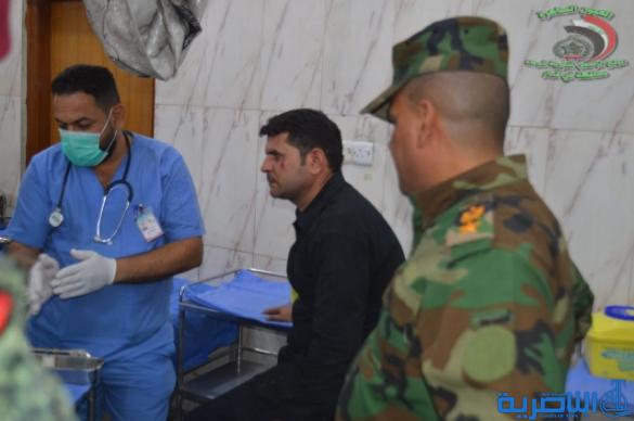 شرطة ذي قار تعلن اصابة 36 منتسبا من عناصرها في تظاهرة الناصرية - تقرير مصور - 
