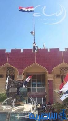 بالصور .. العلم العراقي يرفرف في تكريت