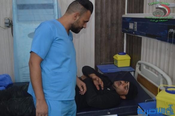 شرطة ذي قار تعلن اصابة 36 منتسبا من عناصرها في تظاهرة الناصرية - تقرير مصور - 